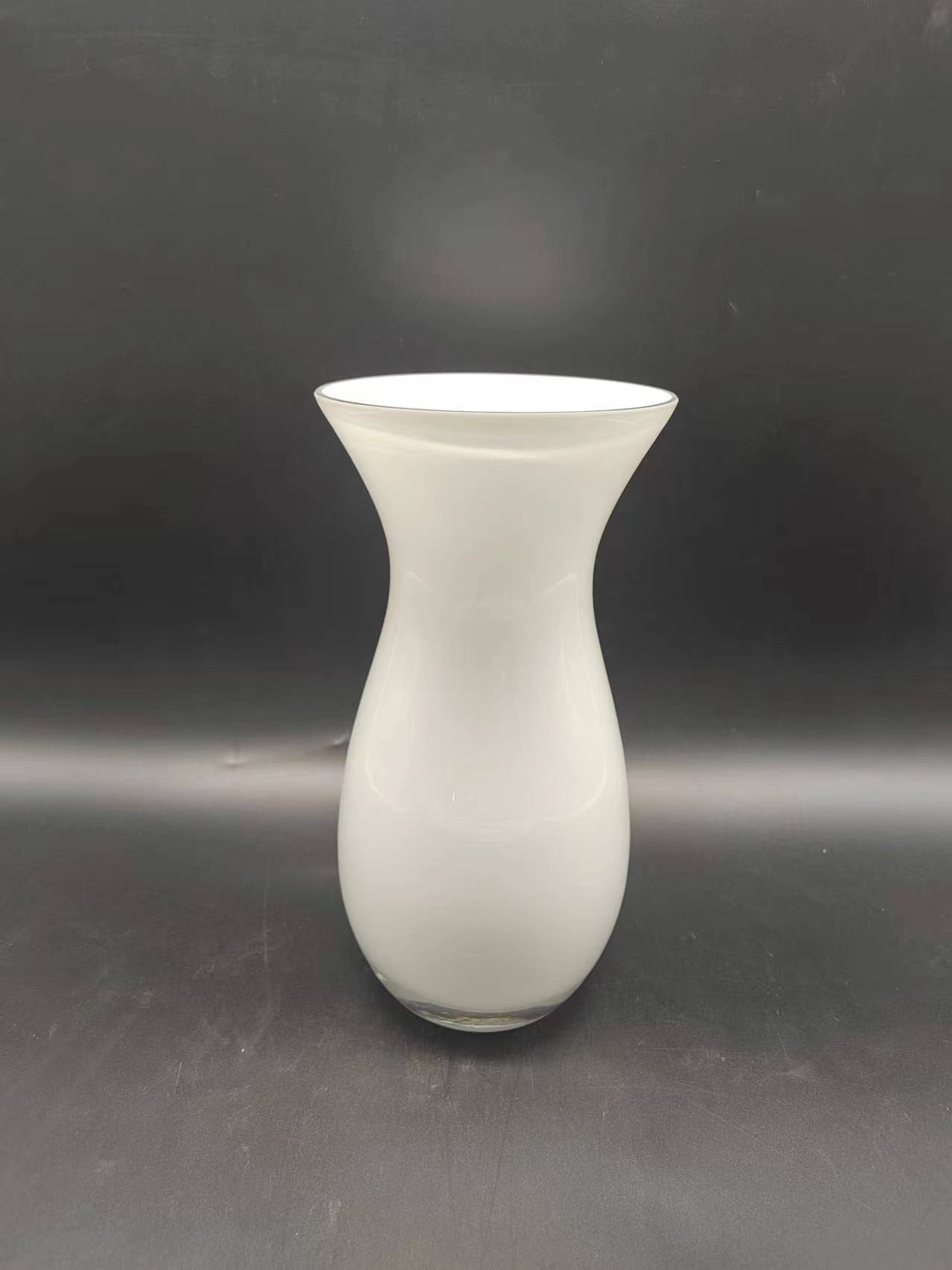 Glass vase in white primary color hand-made