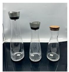 A group of Clear glass juice jar with  lid 