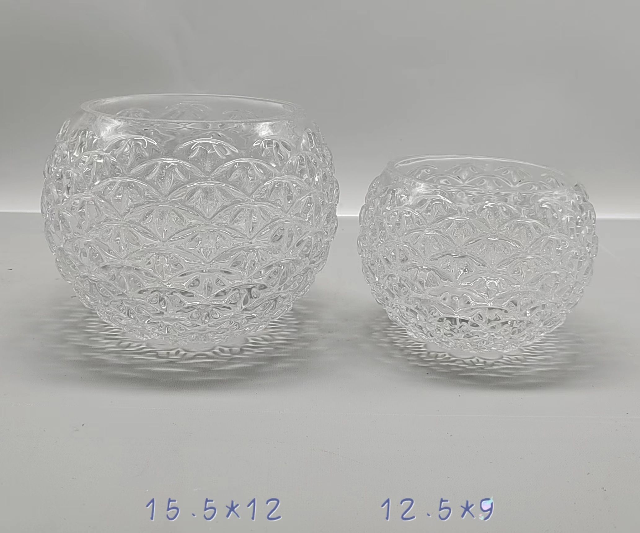 A group of Clear glass ball with pattern