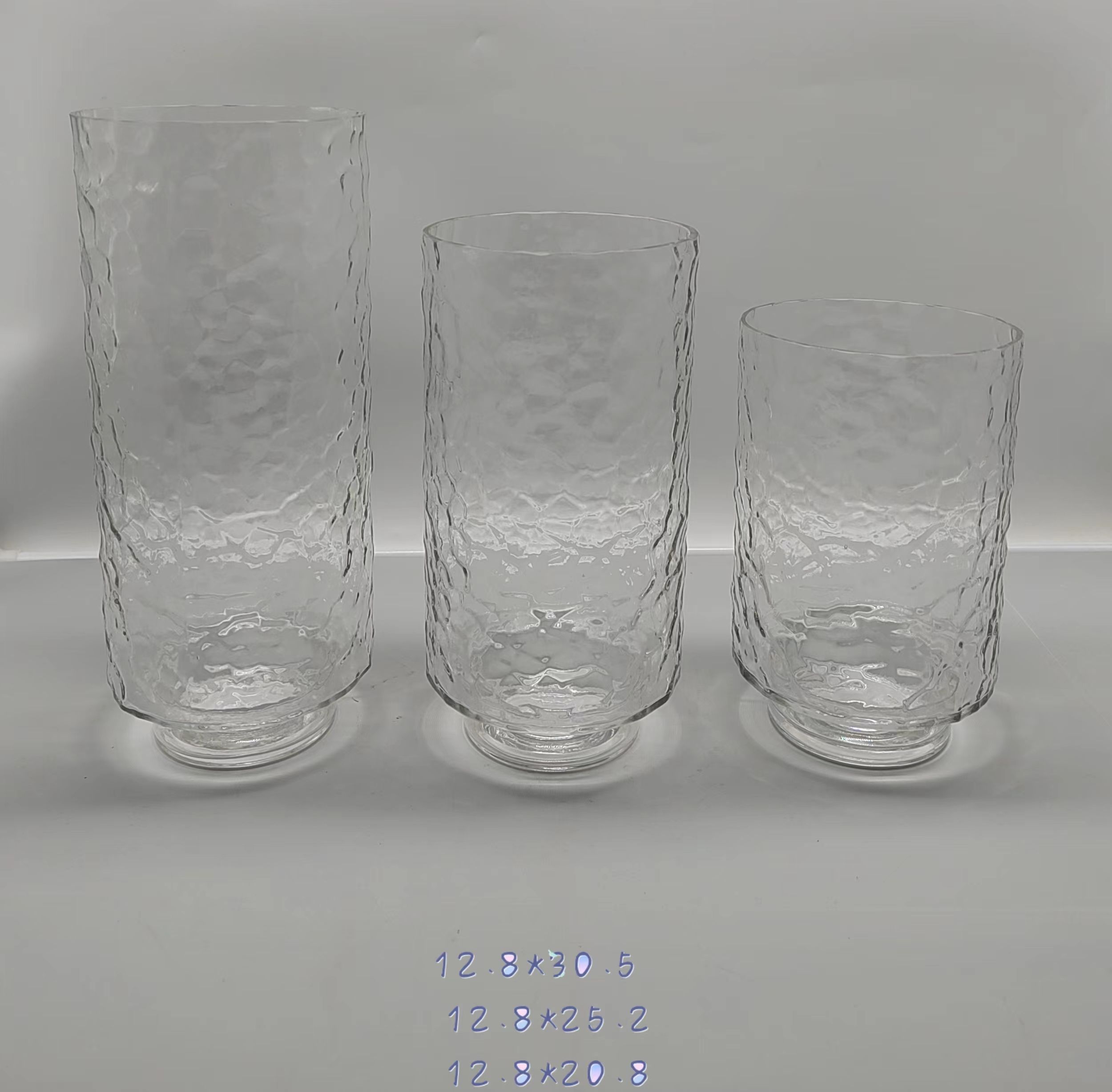 A group of clear glass vase made-hand