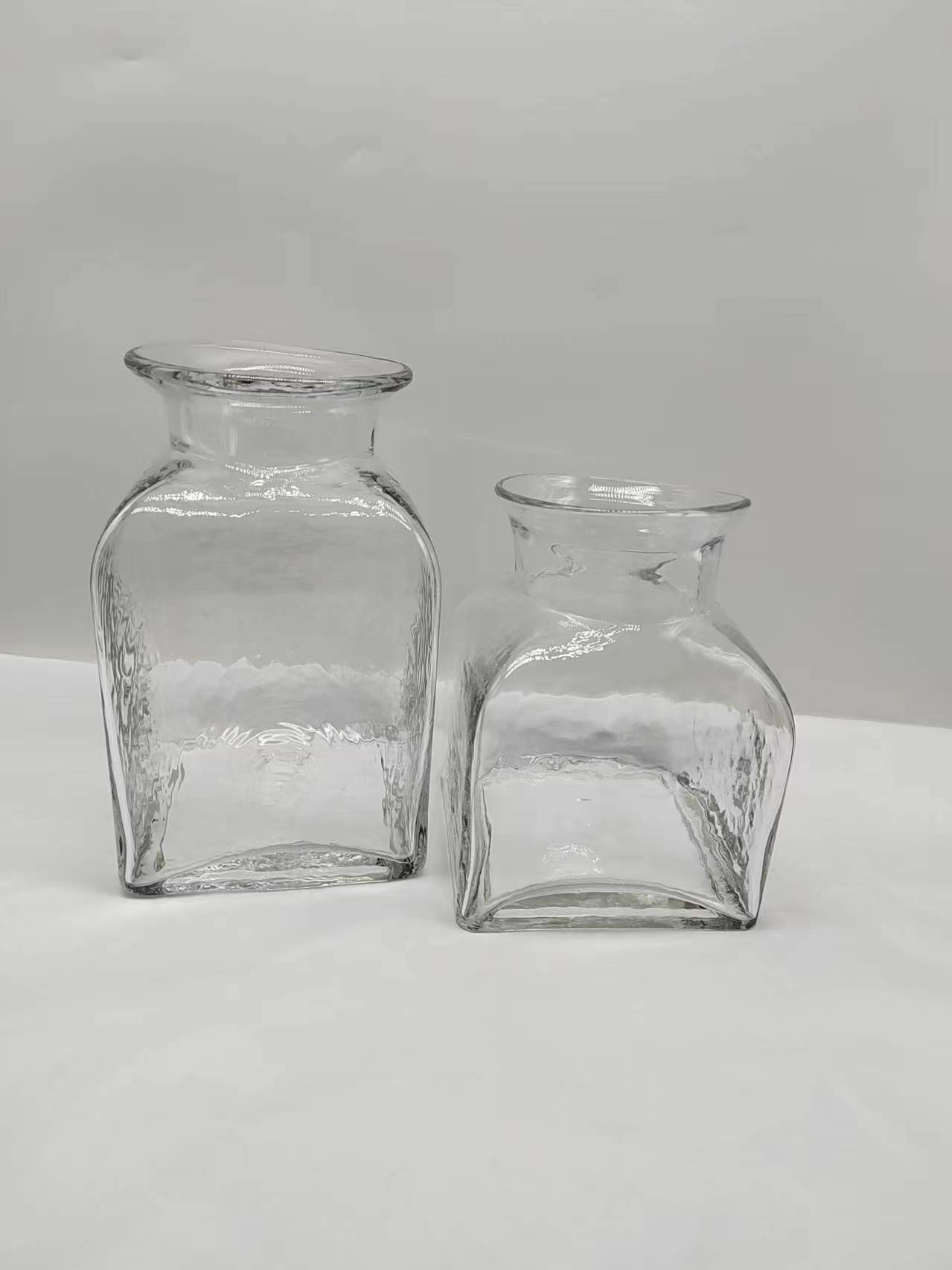A group of clear glass vase made-hand