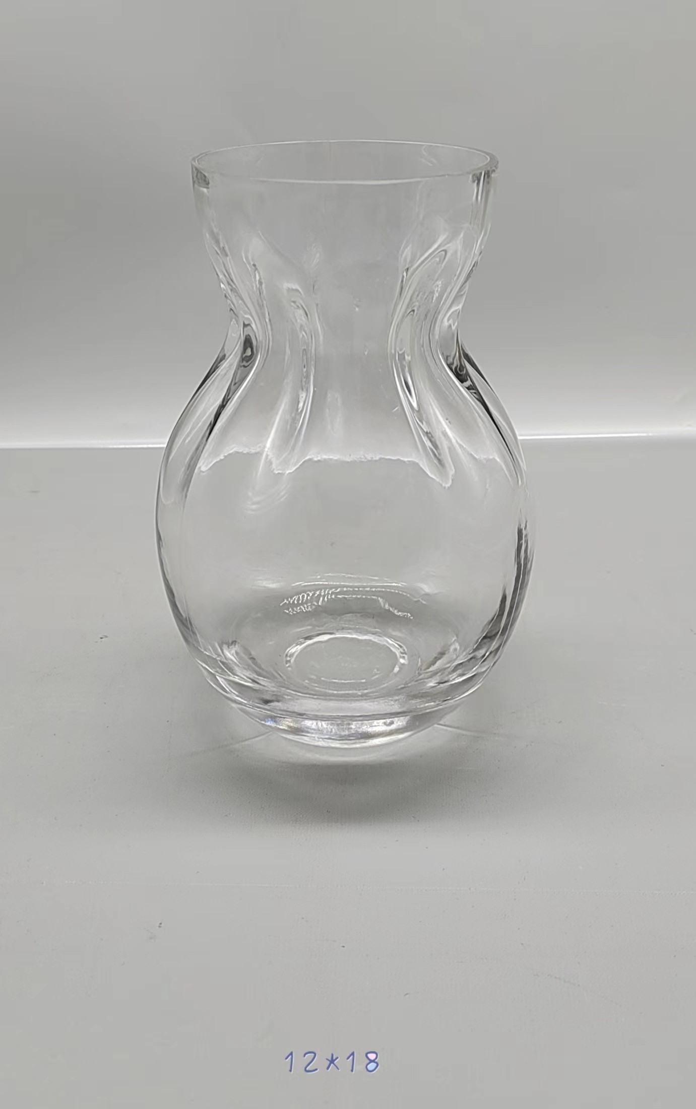 Clear glass vase made by hands