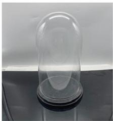 Clear glass jar with wooden base 