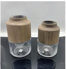 A group of Clear glass vase with wooden 