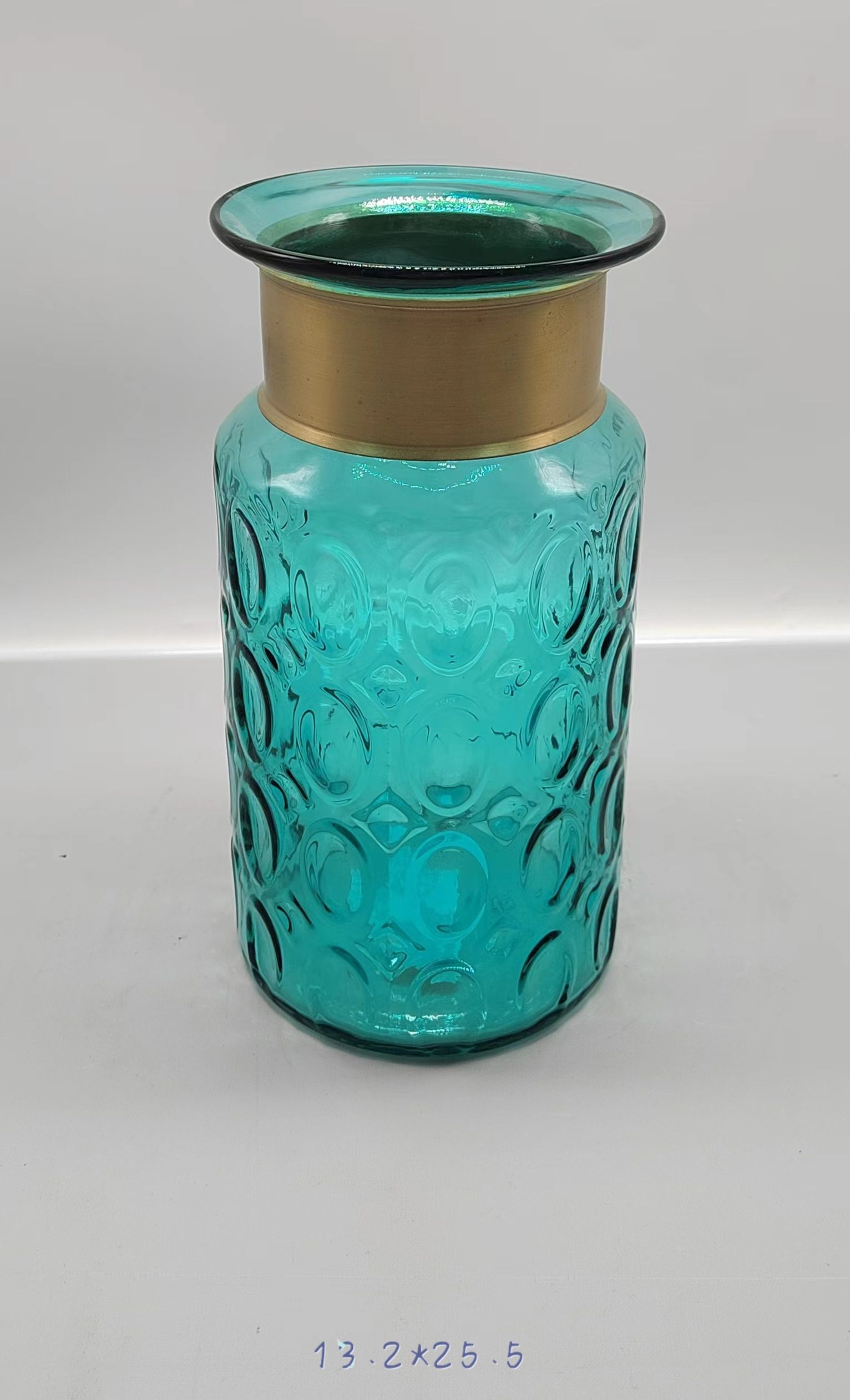 Glass vase in primary green  color with copper ring