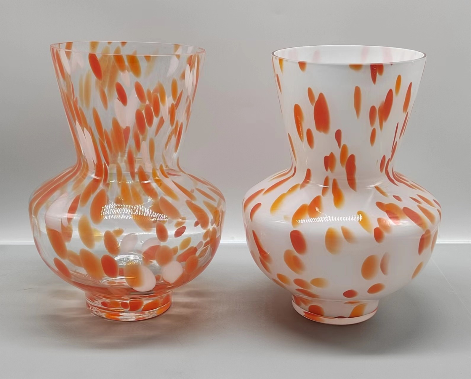 Colorful glass vase with orange dot