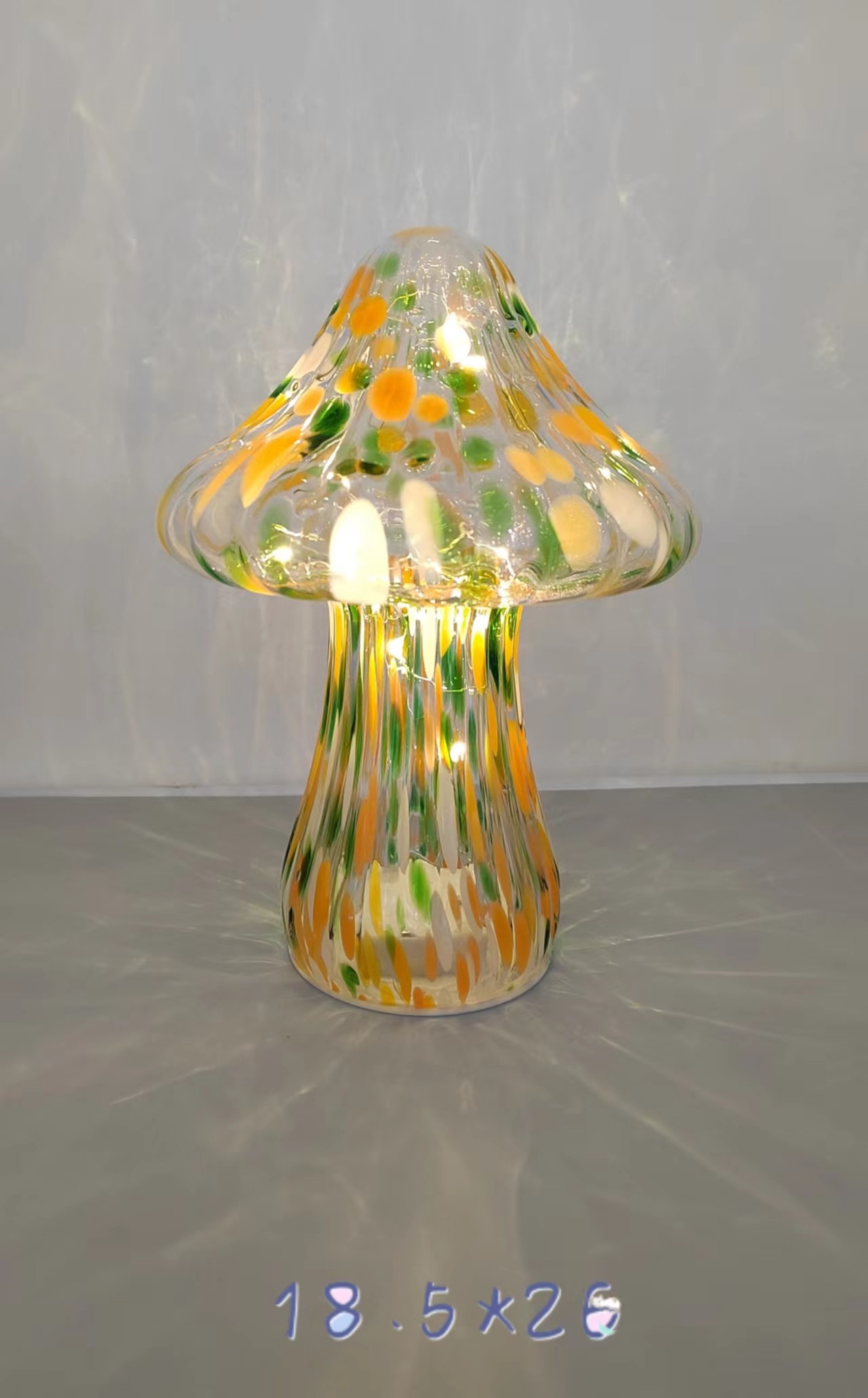 Glass mushroom in primary color with light