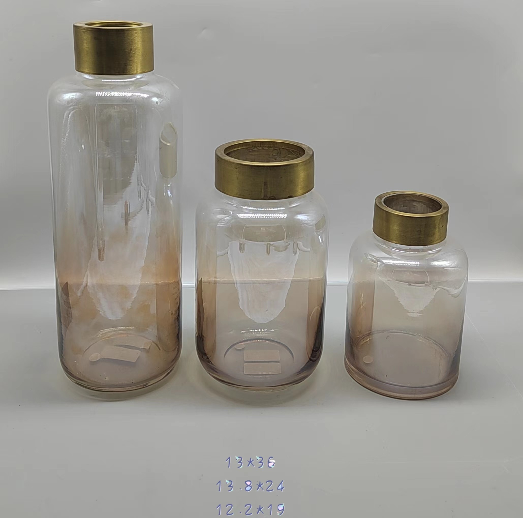 A group of electroplated spray glass vase with copper ring