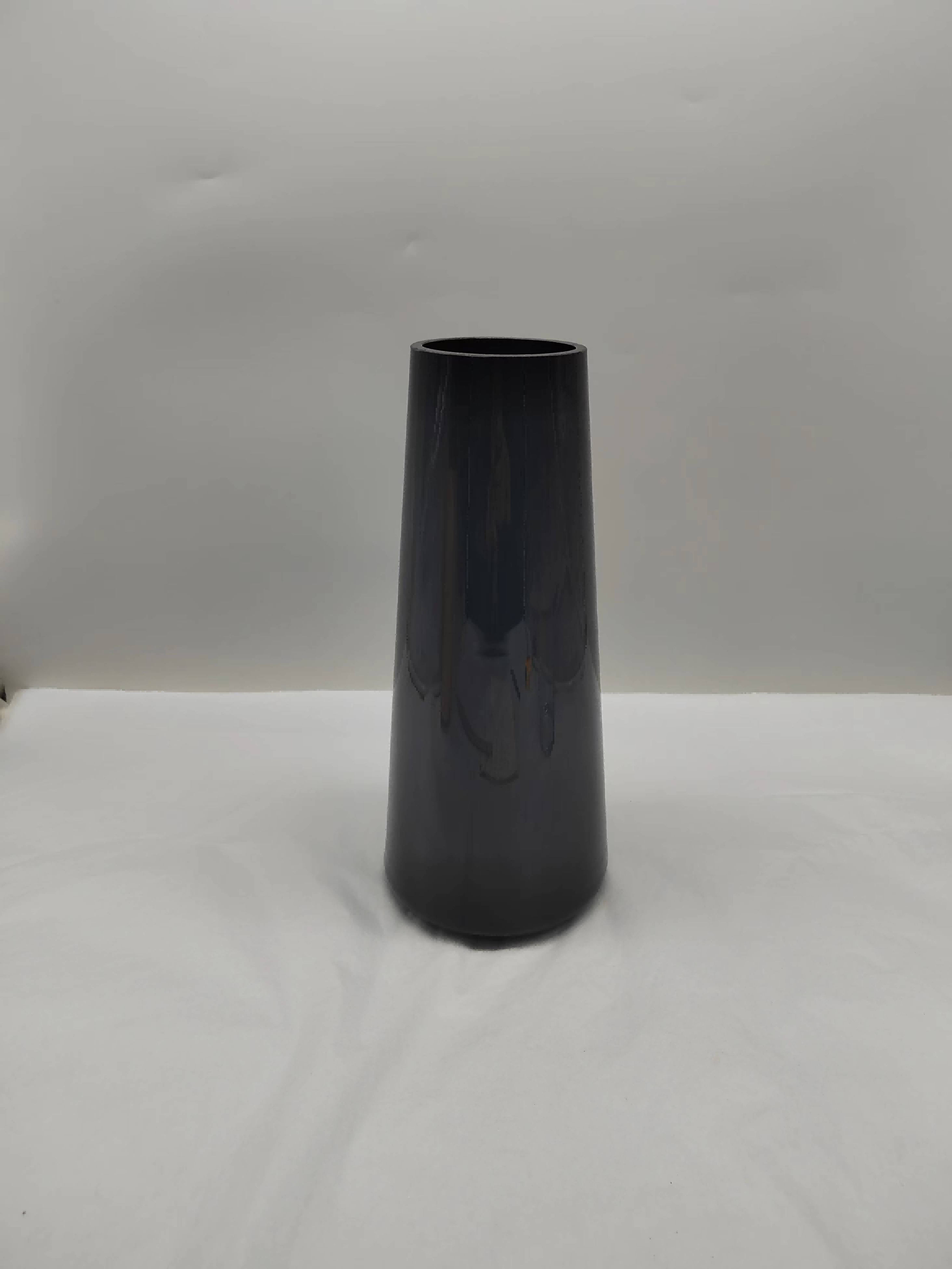 Glass black vase in primary color