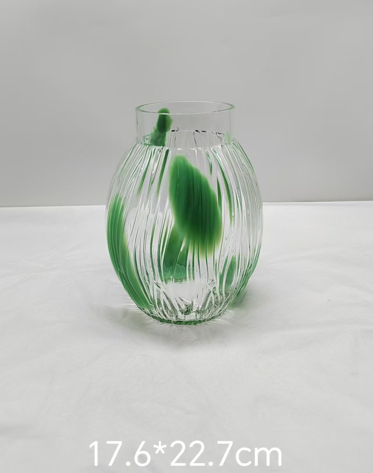 Glass vase with green/white  dot in primary color