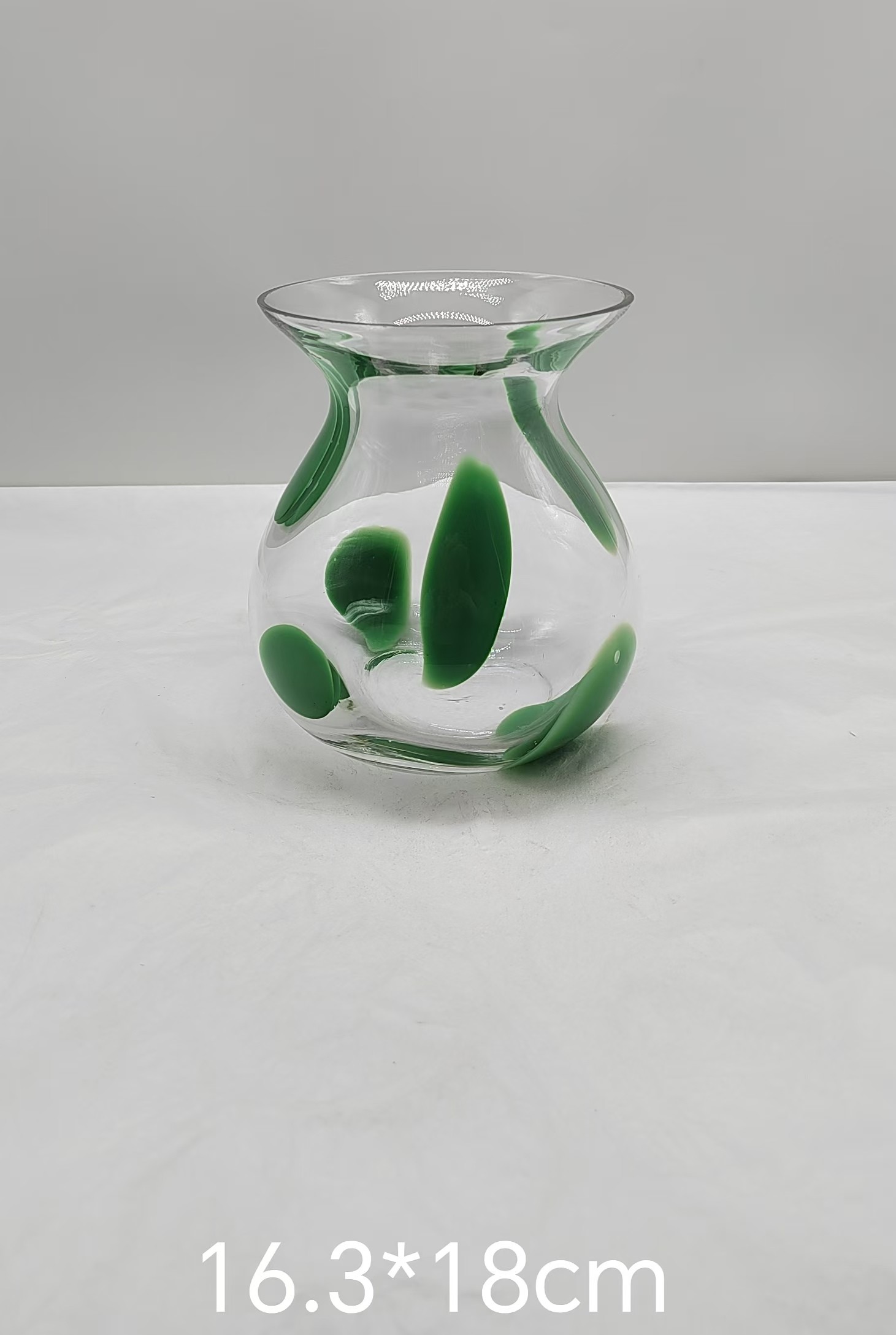 Glass vase with green/white  dot in primary color