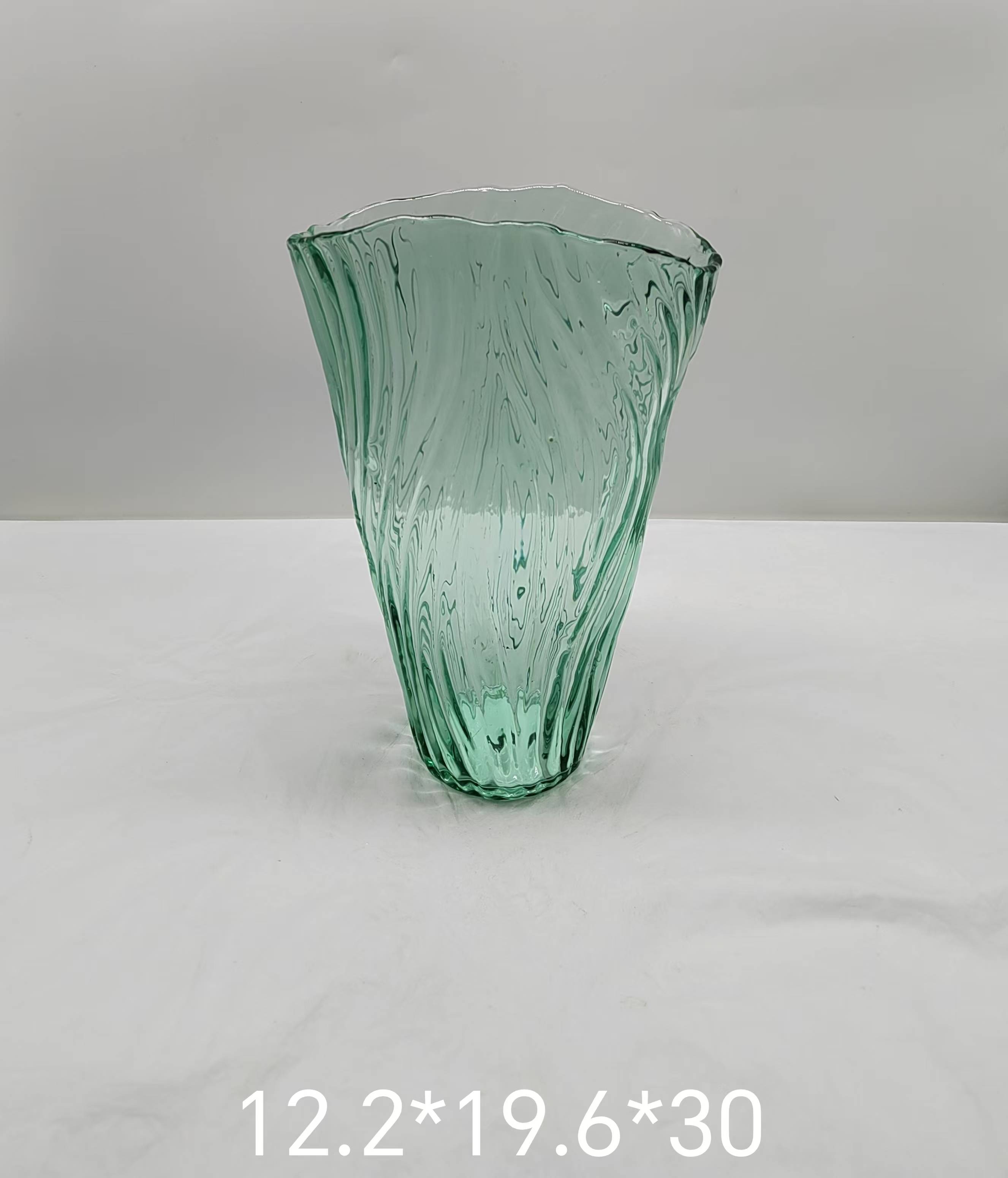 Green glass vase in primary color