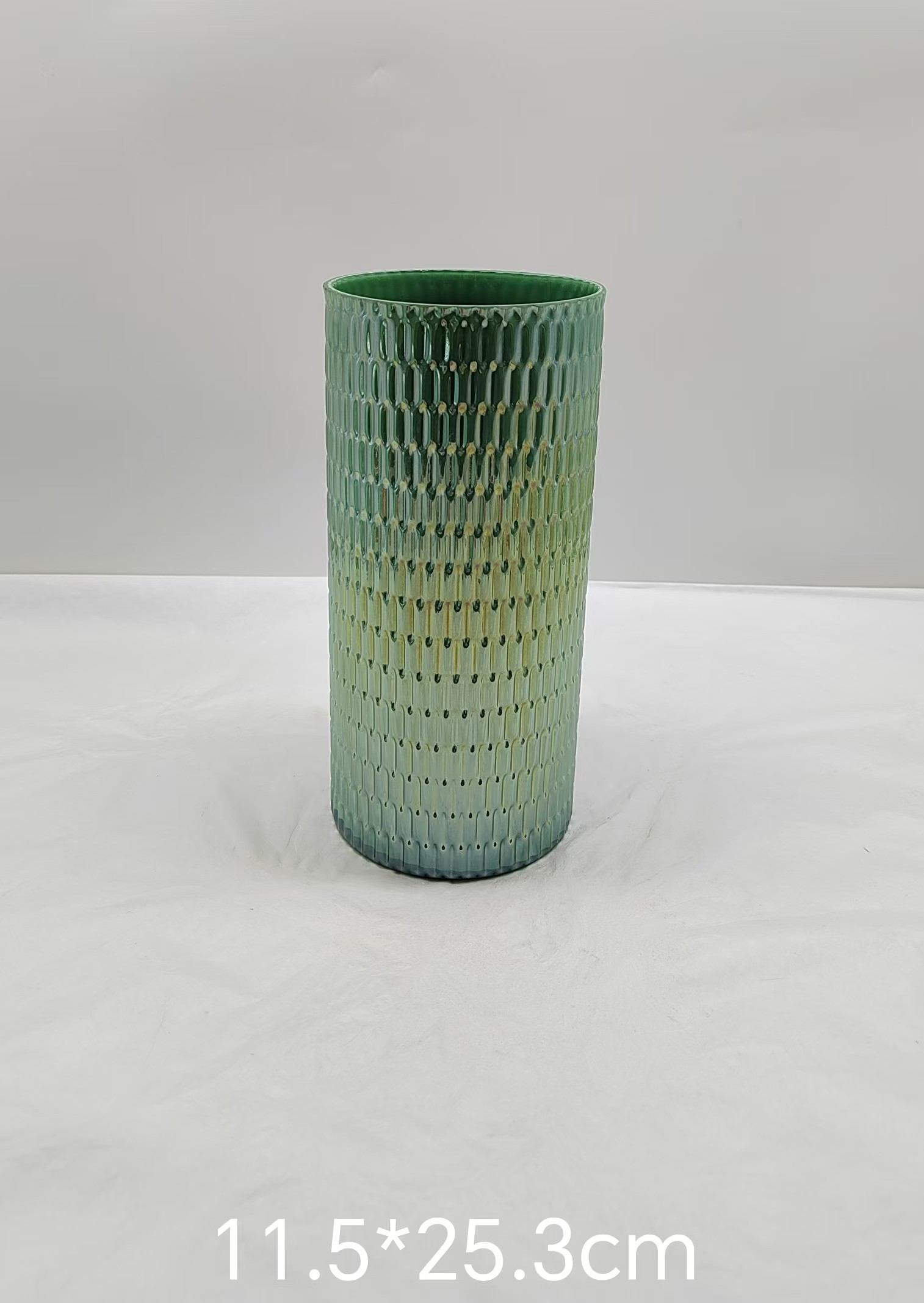 Green glass vase in primary color