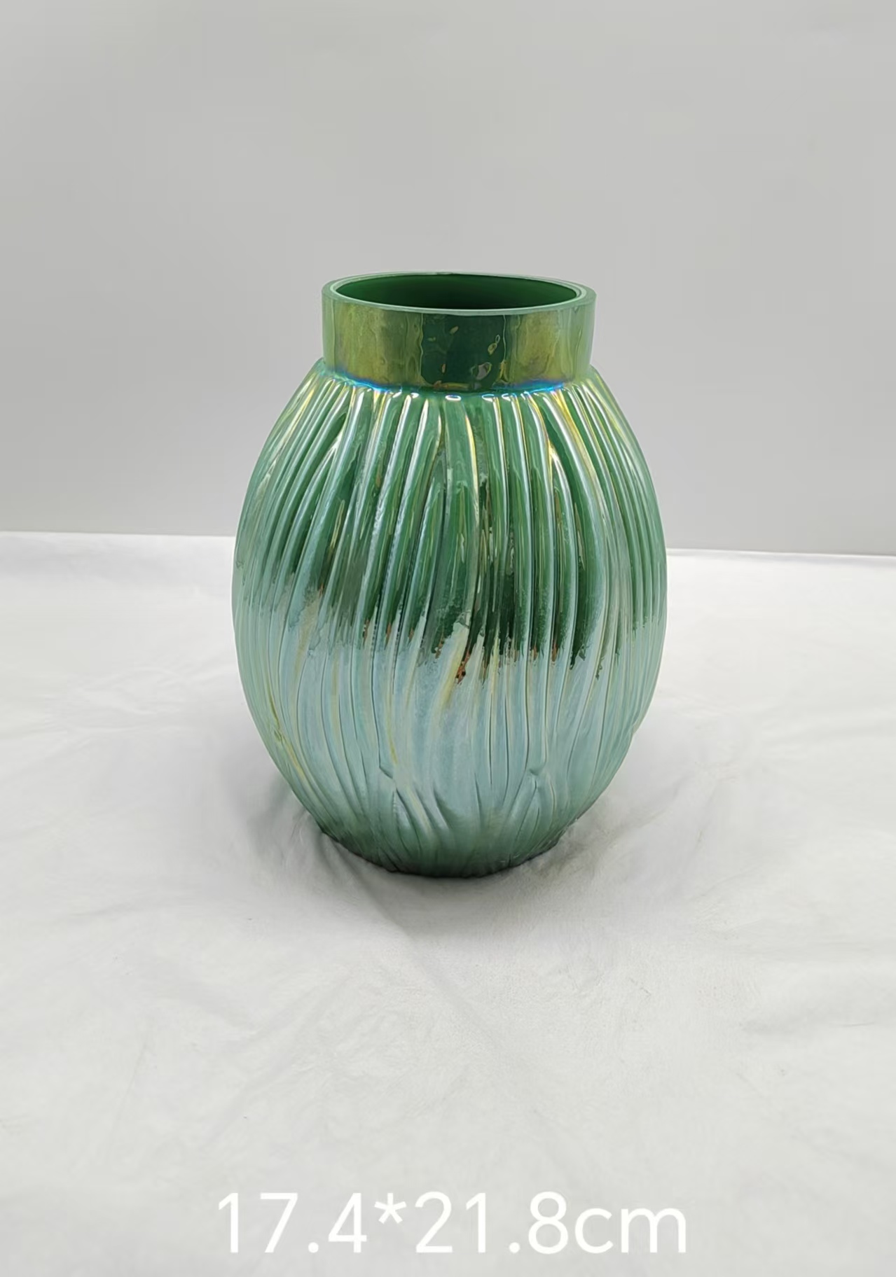 Green glass vase in primary color