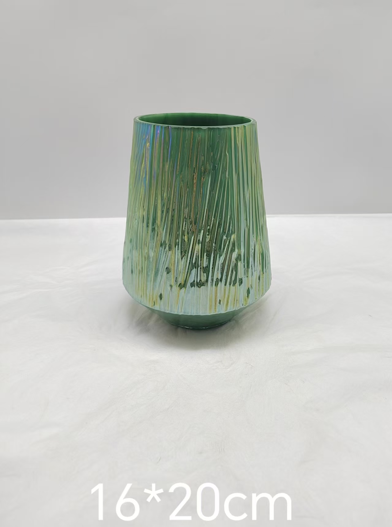 Green glass vase in primary color
