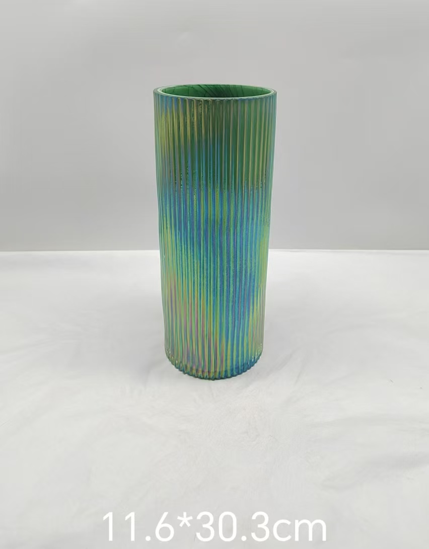 Green glass cylinder vase in primary color