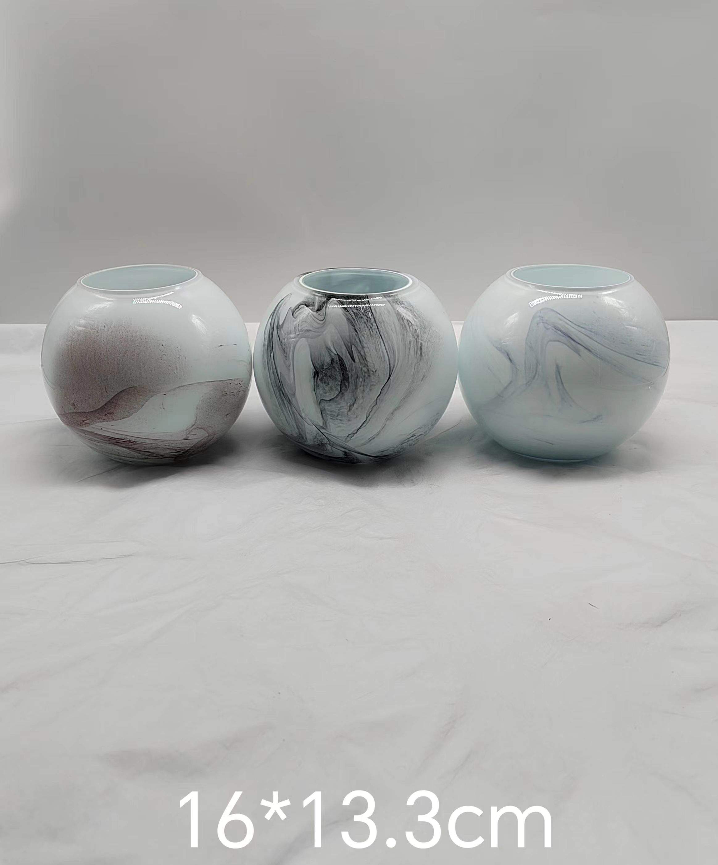 Glass  ball in primary color made by hands