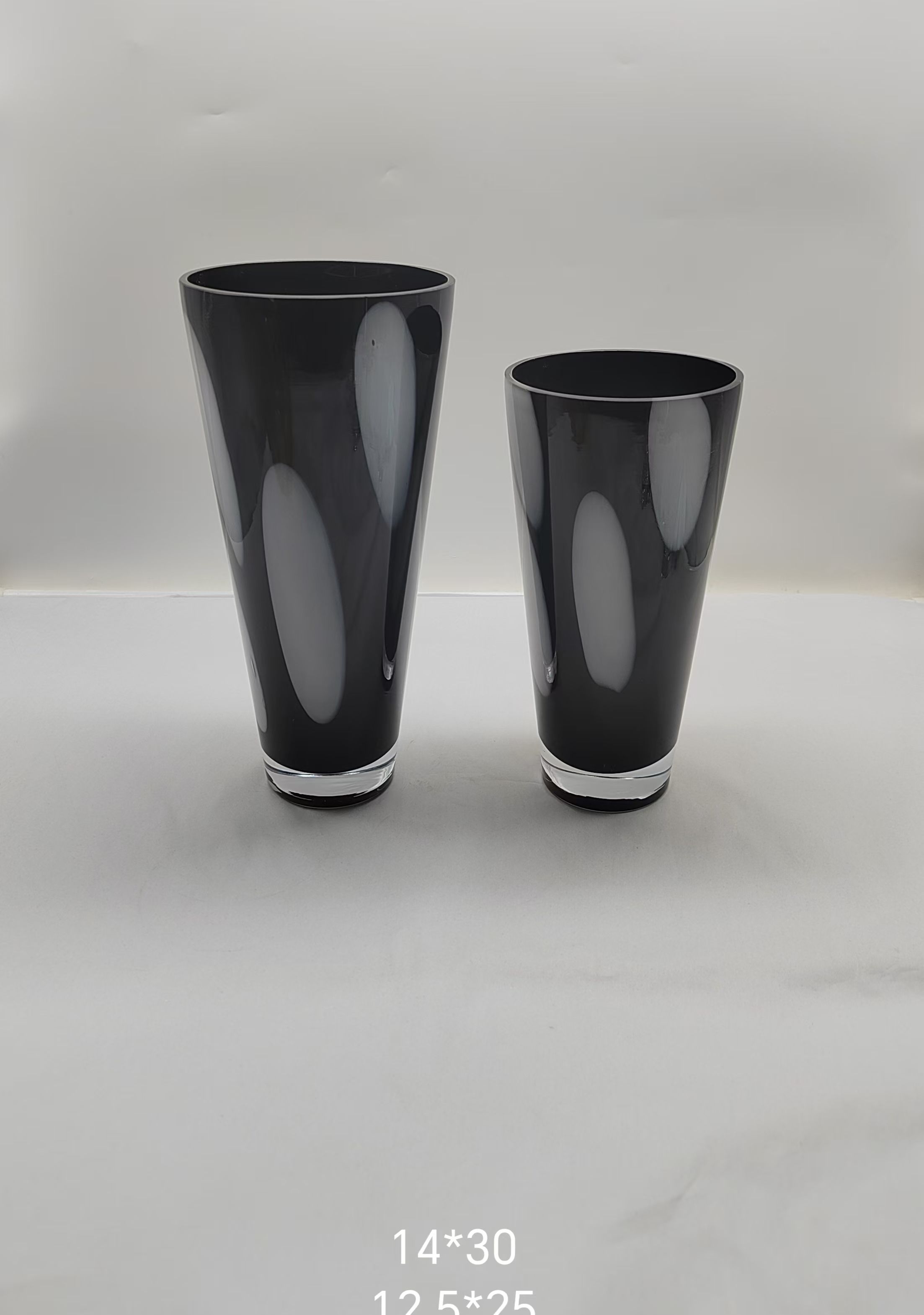 Glass vase in black primary color with white dot  hand-made